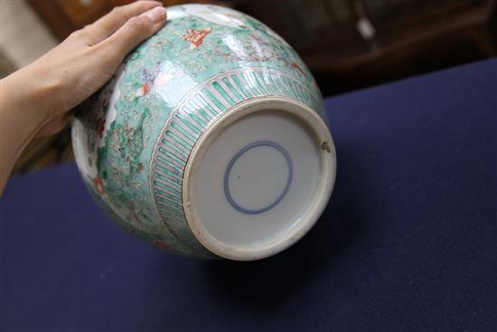 A pair of Chinese famille verte ovoid jars and covers, late 19th century, 31cm, one cover repaired